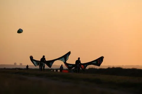 Kite surfing while sunset 스톡 사진