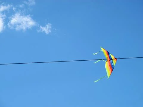 Kite tangled in the wire Stock Photos