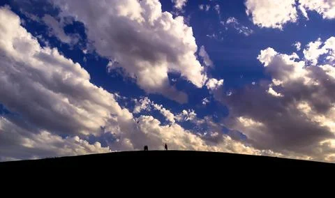 Kite in the wind and sky with clouds Stock Photos