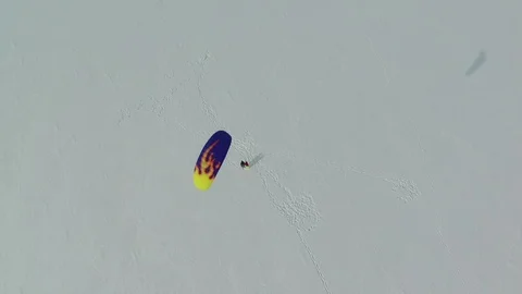 Kite in winter on snow. Top-down aerial view. Video stock 87299651