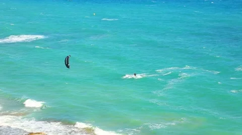 Kite zone. Kiters in action in Costa Blanca, Benidorm.  Stock Footage 64755345