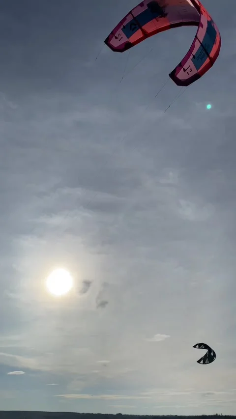 Kiteboarder ketch the wind on sunset Stock Footage 238976404