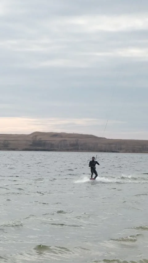 Kiteboarder ketch the wind on sunset Stock-Footage 238976649