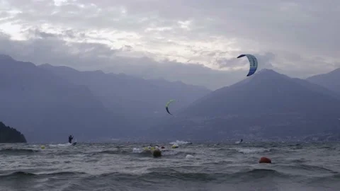 Kiteboarders Are Pulled Across Como Lake Water. Stock Footage 162299288