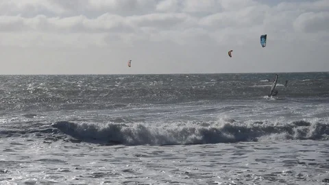 Kiteboarders on the Pacific coastline Stock Footage 101101751