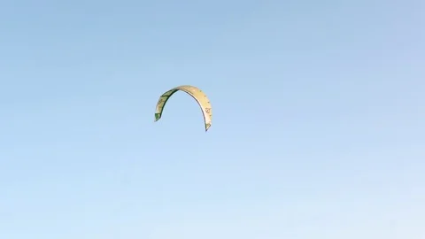 Kiteboarding. Control of a kite, dome of a parachute while riding a kiteboarding Stock Footage 79595789