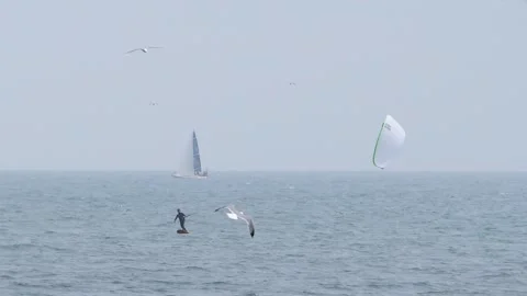 Kiteboarding, Rides the Waves. Stock Footage 130391791