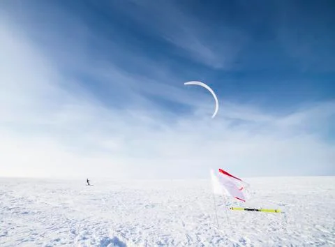 Kiteboarding on snow Stock Photos