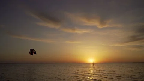 Kiter is training to control the kite in the sea Stock Footage 132319620