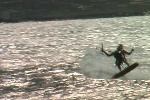 Kitesurf-powered forward-slash n air Stock Footage 1001989
