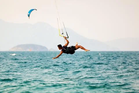 Kitesurfer Falling Mid Air After Losing Board Stock Photos