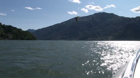 Kitesurfer navigating on a lake  Stock Footage 41708775