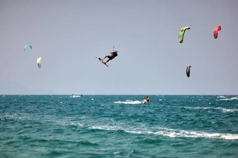 Kitesurfer performs a high Big Air jump over the sea in Nha Trang, Vietnam Stock Photos