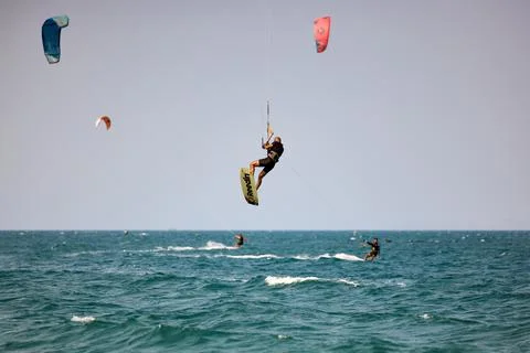 Kitesurfer performs a high Big Air jump over the sea in Nha Trang, Vietnam Stock Photos