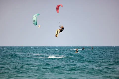 Kitesurfer performs a high Big Air jump over the sea in Nha Trang, Vietnam Stock Photos