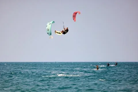 Kitesurfer performs a high Big Air jump over the sea in Nha Trang, Vietnam Stock Photos