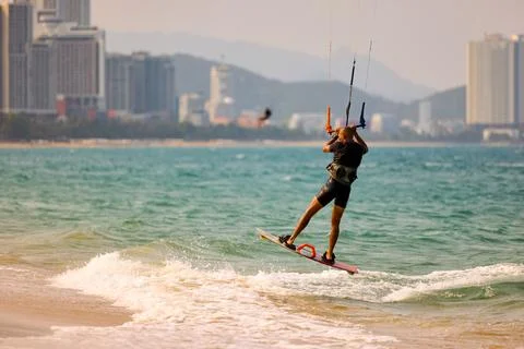 Kitesurfer returns toward shore after session in Nha Trang Vietnam Stock Photos
