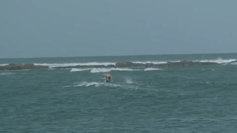 Kitesurfer Riding Ocean Waves in Slow Motion at Sunshine Coast, Queensland Stock Footage 341307249