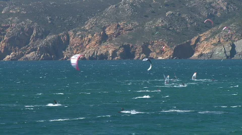 Kitesurfers in action on beach Stock Footage 597070