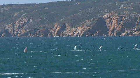 Kitesurfers in action on beach Stock Footage 600841