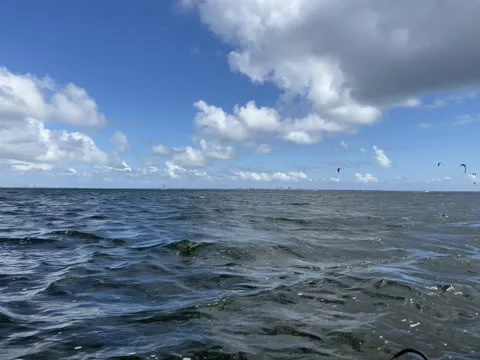 Kitesurfers in the distance Stock Footage 277913002