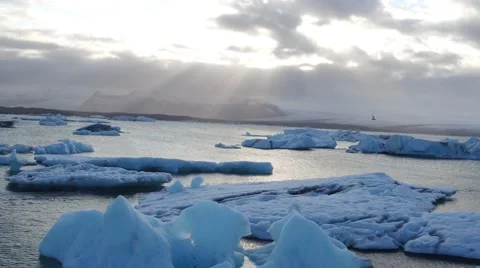 KITESURFERS TALKING ON AN ICEBERG Stock-Footage 67612411