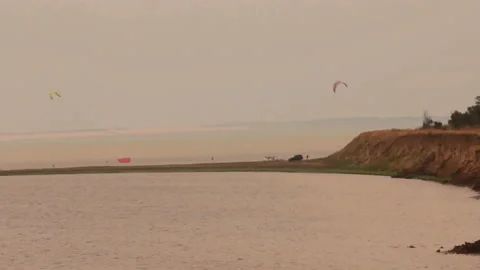 Kitesurfers training in a deserted area Stock-Footage 155385995