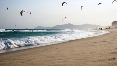 Kitesurfers on the waves Stock Footage 73490263