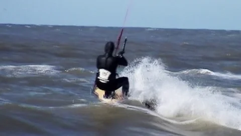 Kitesurfers on the waves Stock Footage 85285124