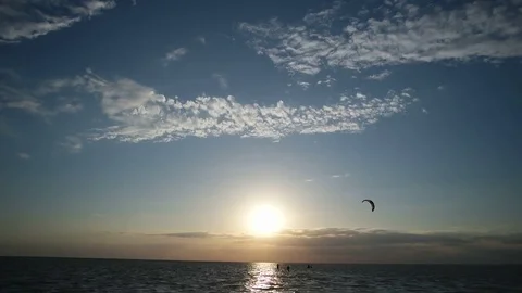 Kitesurfing at sunset Stock Footage