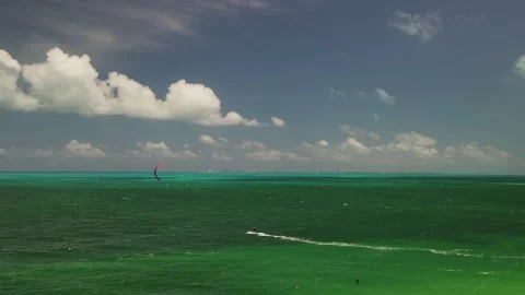 Kitesurfing on waves Stock Footage 153779541