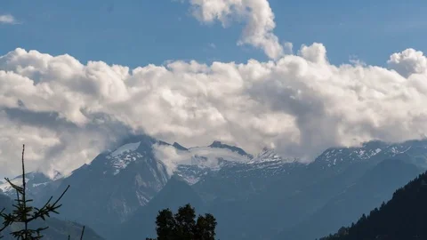 Kitzsteinhorn in the alps nice timelapse clouds floating over the mountains Stock Footage 84919612