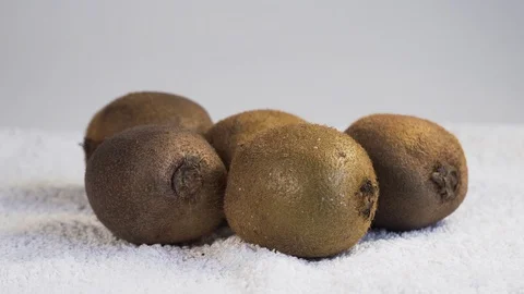 Kivi are on the white background Stock Footage 127857613