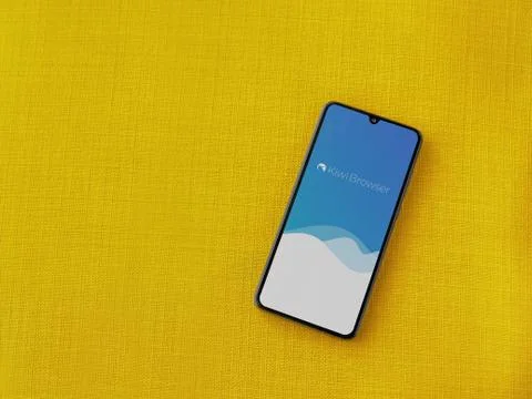 Kiwi Browser app launch screen with logo on the display of a black mobile sma Stock Photos