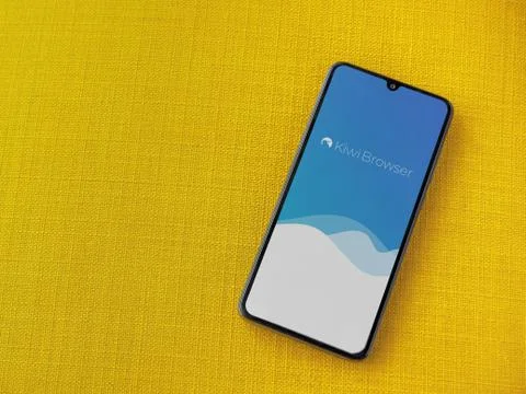 Kiwi Browser app launch screen with logo on the display of a black mobile sma Stock Photos