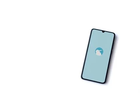 Kiwi Browser app launch screen with logo on the display of a black mobile sma Stock Photos