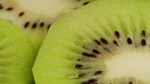 Kiwi close-up macro. Slice fresh exotic kiwi fruit texture background . Health Stock Footage 260414018