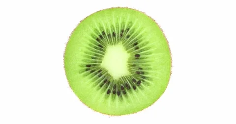 Kiwi cut in middle rotating 스톡 동영상 165729637