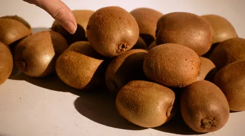 Kiwi Cut Open Next To A Bunch Stock Footage 48068982