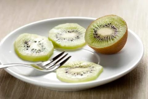 Kiwi on a Dish Stock Photos