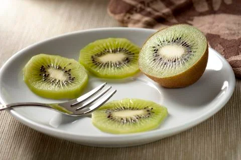Kiwi on a Dish Stock Photos