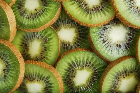 Kiwi fruit close-up wedges with a pattern in the form of a pattern. Stock Photos