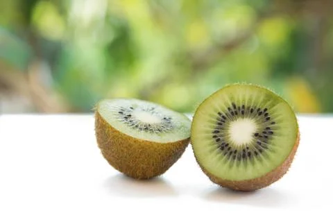 Kiwi fruit with cuts Stock Photos