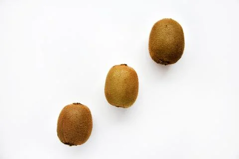 Kiwi fruit fruit on a white background close-up. Delicious green kiwi. Stock Photos
