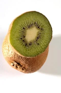 Kiwi fruit on a gray background Stock Photos