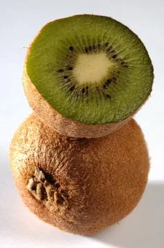 Kiwi fruit on a gray background Stock Photos