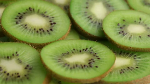 Kiwi fruit slices, closeup Stockbeeldmateriaal 61676773