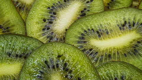 Kiwi Fruit Slices Rotating. Stock Footage 125974061