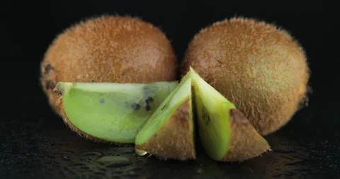 Kiwi Fruit Slices Rotating, macro Stock Footage 107321386
