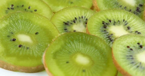 Kiwi Fruit Slices Rotating, macro Stock Footage 107323805